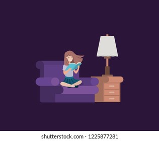 student girl sitting reading book in livingroom