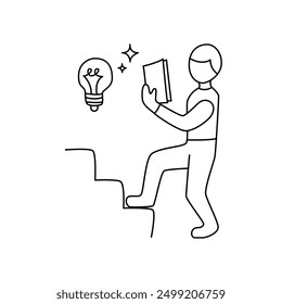 Student reads a book going up the stairs