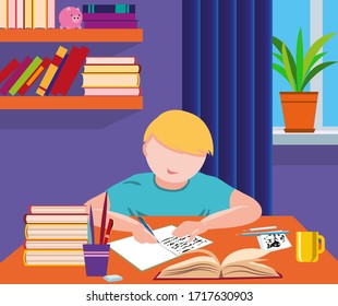 The student sits at the table and does homework, lessons, writes in a notebook. The boy is home.