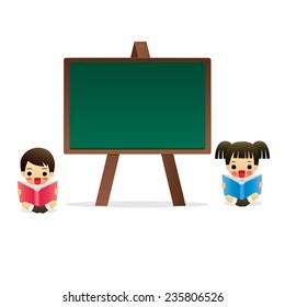 student sitting in front of a blackboard.