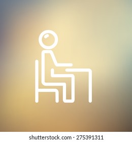 Student sitting on a chair in front of his table icon thin line for web and mobile, modern minimalistic flat design. Vector white icon on gradient mesh background.