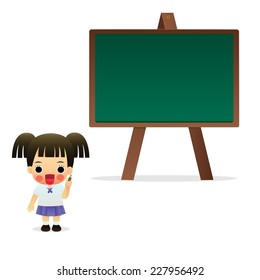 student standing in front of a blackboard