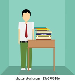 Student in uniform standing with a stack of books on a desk