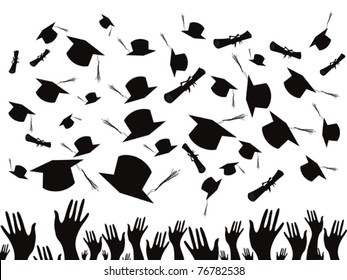 Students graduating and tossing caps