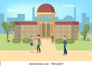 Students relaxing and studying near university in park.