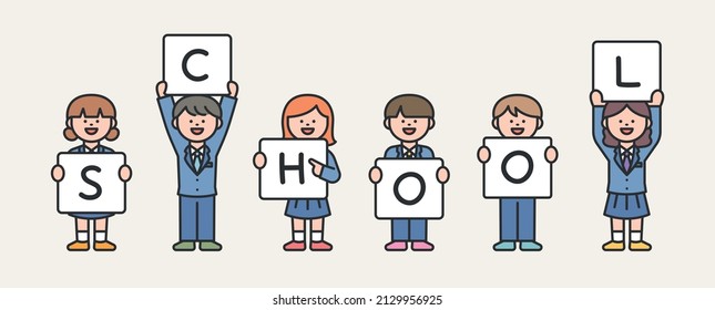 Students in school uniforms are standing with signs.