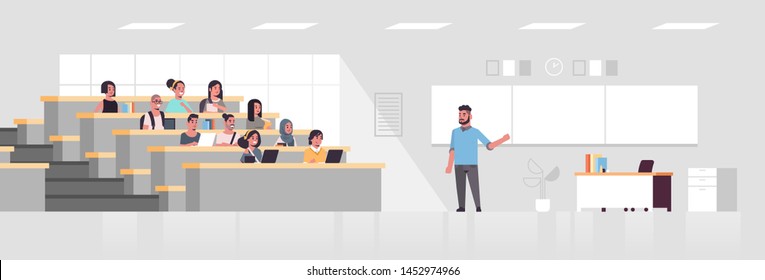 students sitting at college lecture hall and listening to university male professor over chalkboard education concept modern classroom interior flat full length horizontal