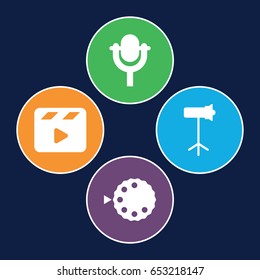 Studio icons set. set of 4 studio filled icons such as movie clapper, microphone, studio lapm