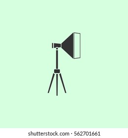 Studio lighting icon flat. Grey vector symbol on green background