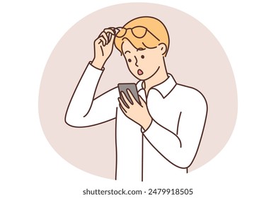 Stunned man take off glasses look at cellphone screen feeling astonished. Shocked guy surprised with message on smartphone. Vector illustration.