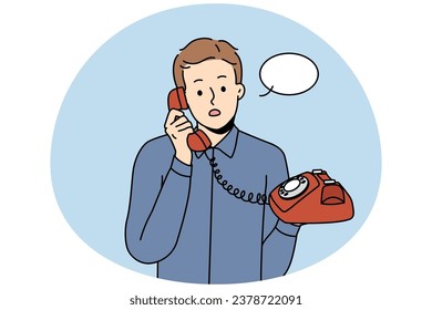 Stunned young man talking on landline phone. Amazed male with speech bubble above head speak on wired headset. Vector illustration.