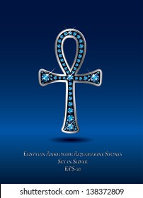 Stunning Egyptian Ankh symbol with aquamarine semi-precious stones embedded into a silver channel setting. Birthstone for March. Vector.