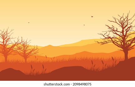 A stunning high mountain next to a vast forest and on the edge of a village