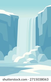 Stunning icy waterfall cascading between snow covered cliffs