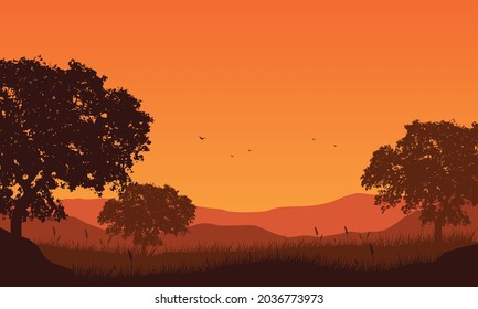 Stunning mountain views from the countryside at dusk with the silhouettes of large trees around it. Vector illustration of a city