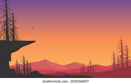 Stunning mountains view from the edge of the city at dusk with the silhouette of dry trees around it. Vector illustration of a city