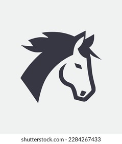 Una impresionante silueta vectorial de cabeza de caballo, perfecta para logotipos y diseños. Elegante y poderoso, este diseño seguro que impresionará.