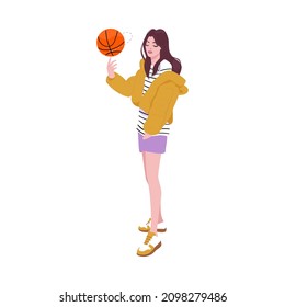 Style girl in fitness club.Fashion girl plays in the ball. Style lady in gym twirls the ball.Women in sport clothes.Fur jacket,fur clothes,sneakers,skirt,t-shirt,fur,fur coat.Young brown long hair gir