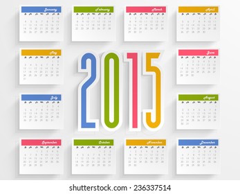 Calendário anual elegante com texto colorido 2015 para comemorações de Feliz Ano Novo.