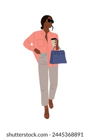 Stylish black woman wearing summer fashion outfit.