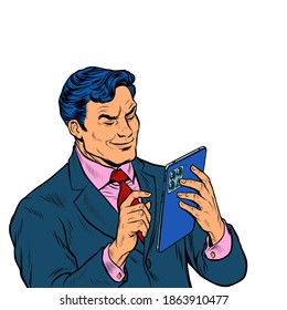 Stylish businessman looks at a modern gadget tablet, works with a touchscreen. Pop art retro illustration 50s 60s kitsch vintage style