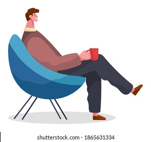 Stylish businessman sitting on armchair at home or restaurant holding a cup in hand drinking coffee. Male character having lunch in a restaurant or cafe. Office employee resting during break