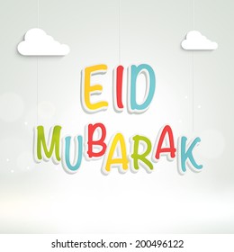Stylish colourful text Eid Mubarak with clouds on shiny grey background for Muslim community festival Eid Mubarak celebrations. 