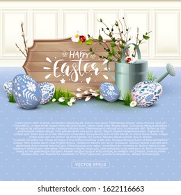Stylish Easter background with wooden sign, blue and white eggs and watering can.
Place for text.