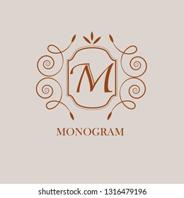 Stylish elegant ornament of monogram letters M. Logo design for cafes, bars, restaurants, hotels, invitations. Business style and brand of the company. Vector illustration.
