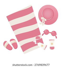 A stylish flat lay of coordinated summer beach essentials in shades of pink and white. 