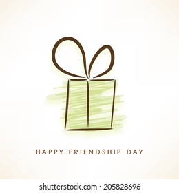 Stylish gift box on grey background for Happy Friendship Day celebrations. 