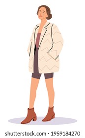 Stylish Girl In A Beige Jacket.Woman With Elegant Hairstyle On Street Style.Stylish Person In Modern Clothes.Cycling Shorts With Coats And Heels.