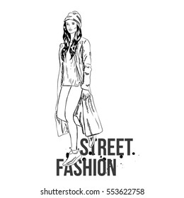 Stylish girl in coat, jeans and sneakers. Street fashion. Vector illustration.