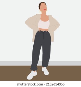 Stylish girl in summer clothes on a gray background