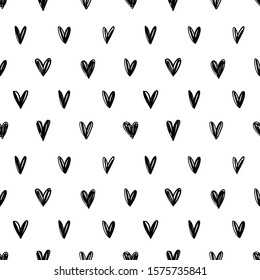 Stylish graphic seamless pattern with hand-drawn hearts. Black and white sketchy background for wrapping paper, fabrics, wallpapers, postcards and more.