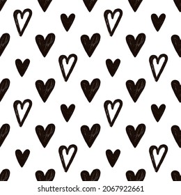 Stylish graphic seamless pattern with hearts. Black and white sketchy background for wrapping paper, fabrics, wallpapers, postcards and more.