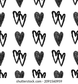 Stylish graphic seamless pattern with hearts. Black and white sketchy background for wrapping paper, fabrics, wallpapers, postcards and more.