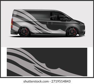 Una elegante furgoneta gris con un diseño gráfico atrevido y un moderno diseño de rueda.
