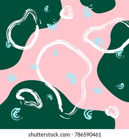 Stylish green spotted pattern with abstract white shapes on a pink background.