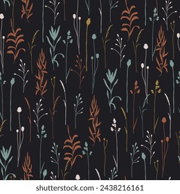 Stylish hand drawn seamless pattern with dry herbs, flowers and leaves on dark background. Natural colours backdrop. Botanical silhouettes. Print for wallpapers, textile, fabric, giftpaper and banner
