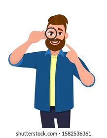 Stylish happy young man looking through magnifier and pointing finger. Trendy person holding magnifying glass or lens. Male character with loupe. Modern lifestyle concept in vector cartoon style.