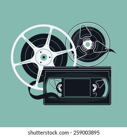 Stylish home video tape and retro motion picture cinema film reels and rolls