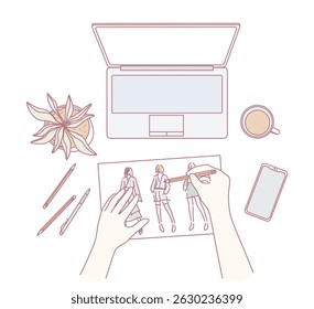 A stylish and inspiring workspace featuring fashion sketches, a laptop, and coffee for endless creative inspiration
