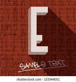 Stylish letter E, on grunge brick wall