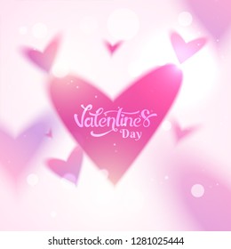Stylish lettering of valentine's day on heart shapes decorated blurred background.