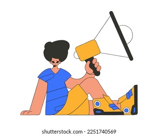 Stylish man sits on the floor and holds a megaphone in his hand.