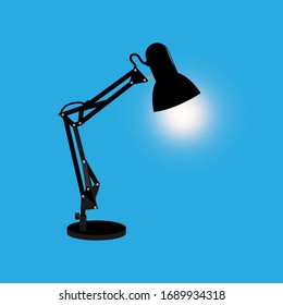 Stylish and modern table lamp with lights on.