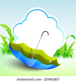 Stylish monsoon season concept with open umbrella on nature background with space for your text.
