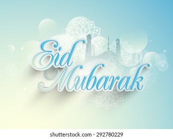 Stylish paper text Eid Mubarak on shiny traditional floral design decorated, mosque silhouette sky blue background for muslim community festival celebration.