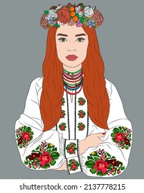 Stylish redhead girl in ukrainian national clothes. Young ukrainian woman in white embroidery decorated with flowers. Traditional fashion style with a necklace and a flower wreath on the head.